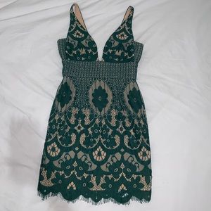 Emerald green and nude dress
